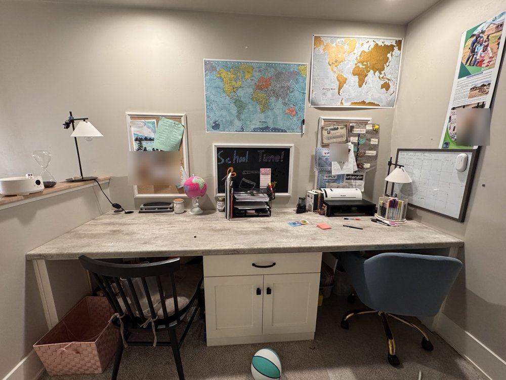 Before: cluttered shared homework desk
